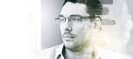 Image showing portrait of businessman in eyeglasses at office