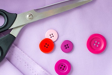 Image showing scissors, sewing buttons and cloth