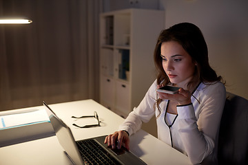 Image showing woman using voice command recorder on smartphone