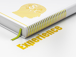 Image showing Business concept: book Head With Finance Symbol, Experience on white background