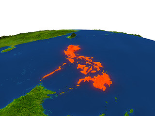 Image showing Philippines in red from orbit