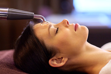 Image showing woman having hydradermie facial treatment in spa