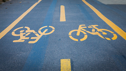 Image showing Bicycle signs painted on asphalt