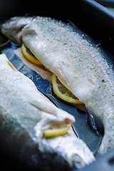 Image showing Fish on frying pan