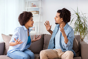 Image showing unhappy couple having argument at home