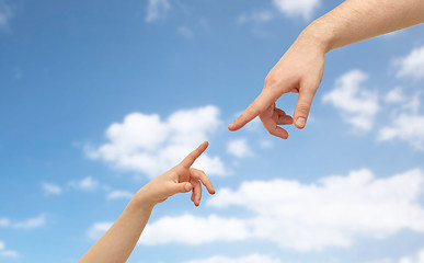 Image showing father and child hands pointing fingers