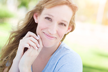 Image showing Outdoor Portrait of Young Adult Brown Eyed Woman.