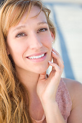 Image showing Outdoor Portrait of Young Adult Brown Eyed Woman.