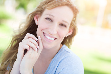 Image showing Outdoor Portrait of Young Adult Brown Eyed Woman.