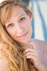 Image showing Outdoor Portrait of Young Adult Brown Eyed Woman.