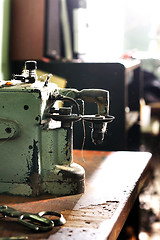 Image showing Sewing machine in a tailor shop. 