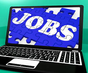 Image showing Jobs Puzzle On Notebook Shows Online Applications