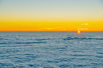 Image showing White clouds at sunrise