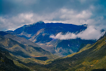 Image showing High mountains in fog