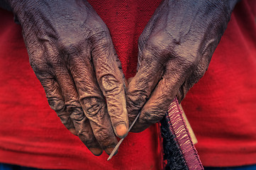 Image showing Womans hands in Dani circuit