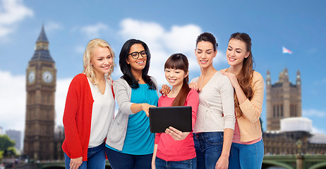 Image showing international group of happy women with tablet pc