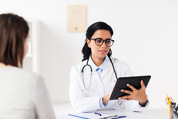 Image showing doctor with tablet pc and woman at hospital