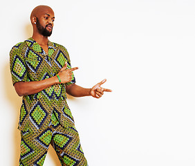 Image showing portrait of young handsome african man wearing bright green nati