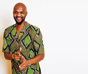 Image showing portrait of young handsome african man wearing bright green nati