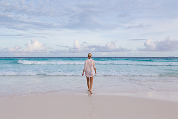 Image showing Woman on summer vacations at tropical beach of Mahe Island, Seychelles.