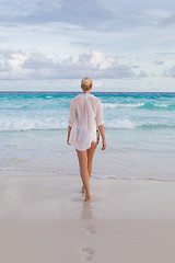 Image showing Woman on summer vacations at tropical beach of Mahe Island, Seychelles.