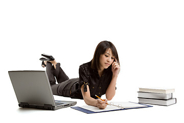 Image showing Studying asian girl