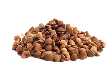 Image showing heap of buckwheat on white background, closeup