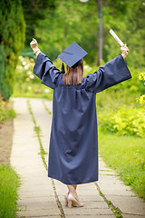 Image showing Young woman graduation day images of graduates are celebrating g