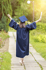 Image showing Young woman graduation day images of graduates are celebrating g