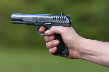 Image showing the TT pistol in hand
