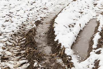 Image showing traces of the car on snow