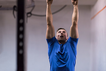 Image showing man doing dipping exercise