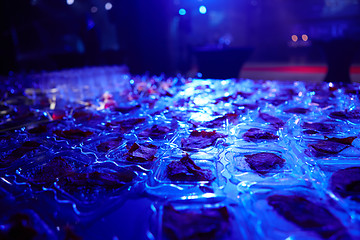 Image showing Beautifully decorated catering banquet table with different food snacks.