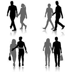 Image showing Set Silhouette man and woman walking hand in hand