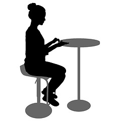 Image showing Silhouette girl sitting on a chair white background