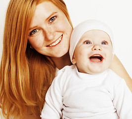 Image showing young beauty mother with baby, red head happy family isolated close up