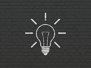 Image showing Business concept: Light Bulb on wall background