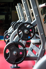Image showing Barbell bench press stands ready to use