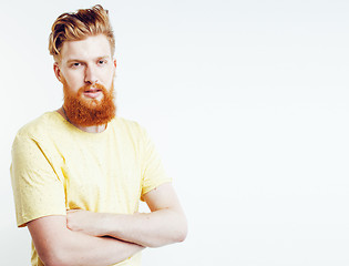 Image showing portrait of young bearded hipster guy smiling on white backgroun