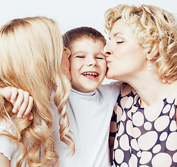 Image showing happy smiling family together posing cheerful on white background, lifestyle people concept, mother with son and teenage daughter isolated 