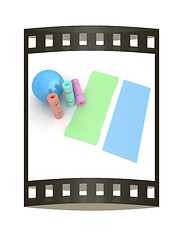 Image showing karemat and fitness ball. 3D illustration. The film strip