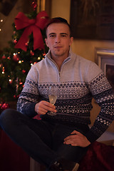 Image showing Happy young man with a glass of champagne