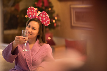 Image showing woman drinking champagne at spa