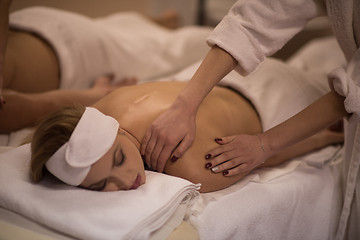 Image showing couple receiving a back massage