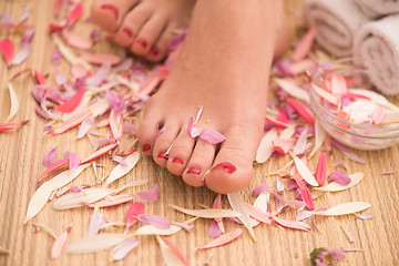 Image showing female feet at spa salon