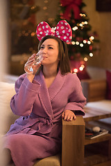 Image showing woman drinking champagne at spa