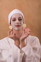 Image showing Spa Woman applying Facial Mask