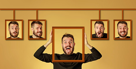 Image showing Young man trying on her emotions