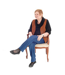 Image showing Senior woman relaxing, sitting.