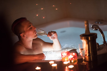 Image showing man relaxing in the jacuzzi